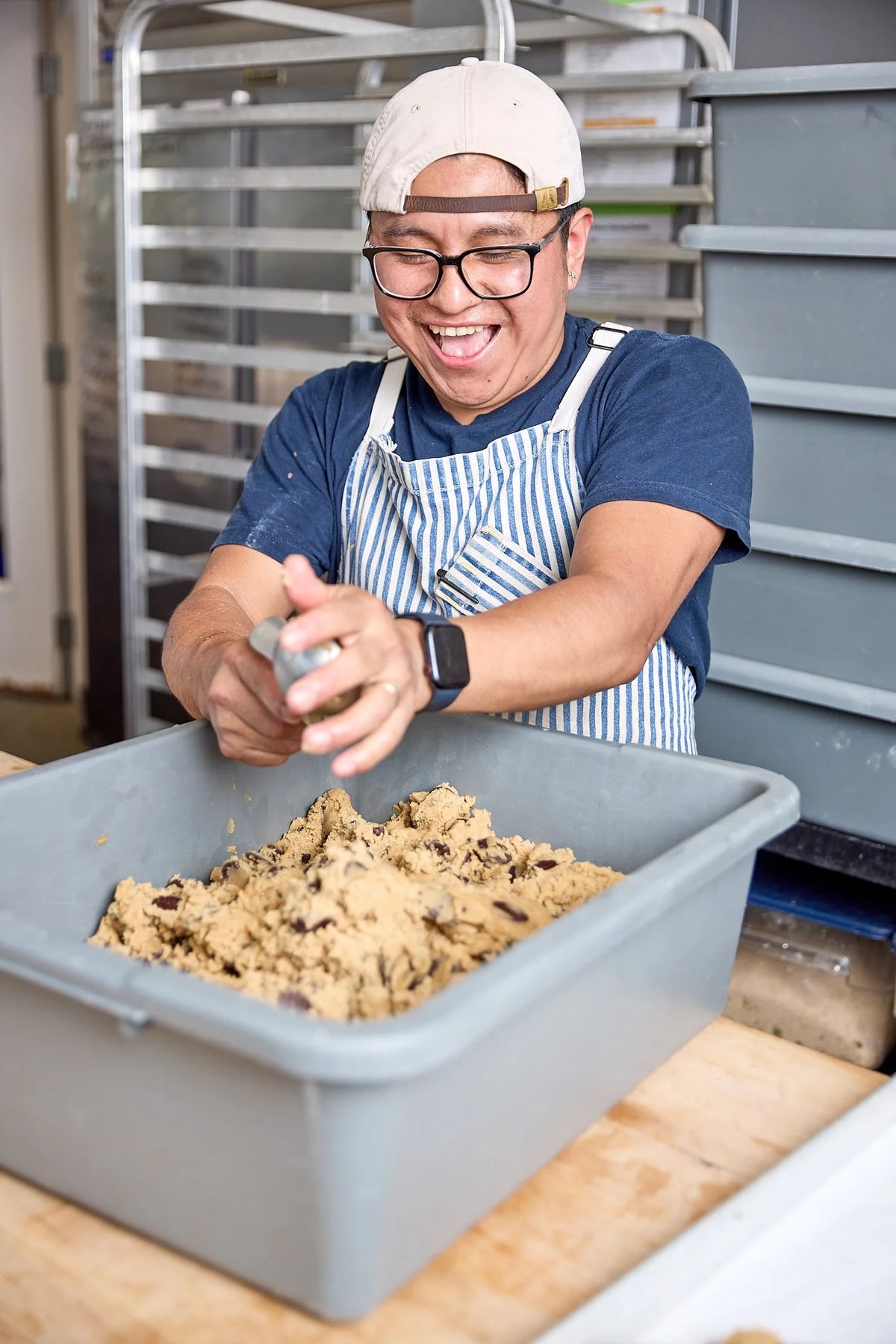 Sprinkling salt onto chocolate chip cookie dough